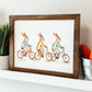 Bunnies on Bikes Framed Sign