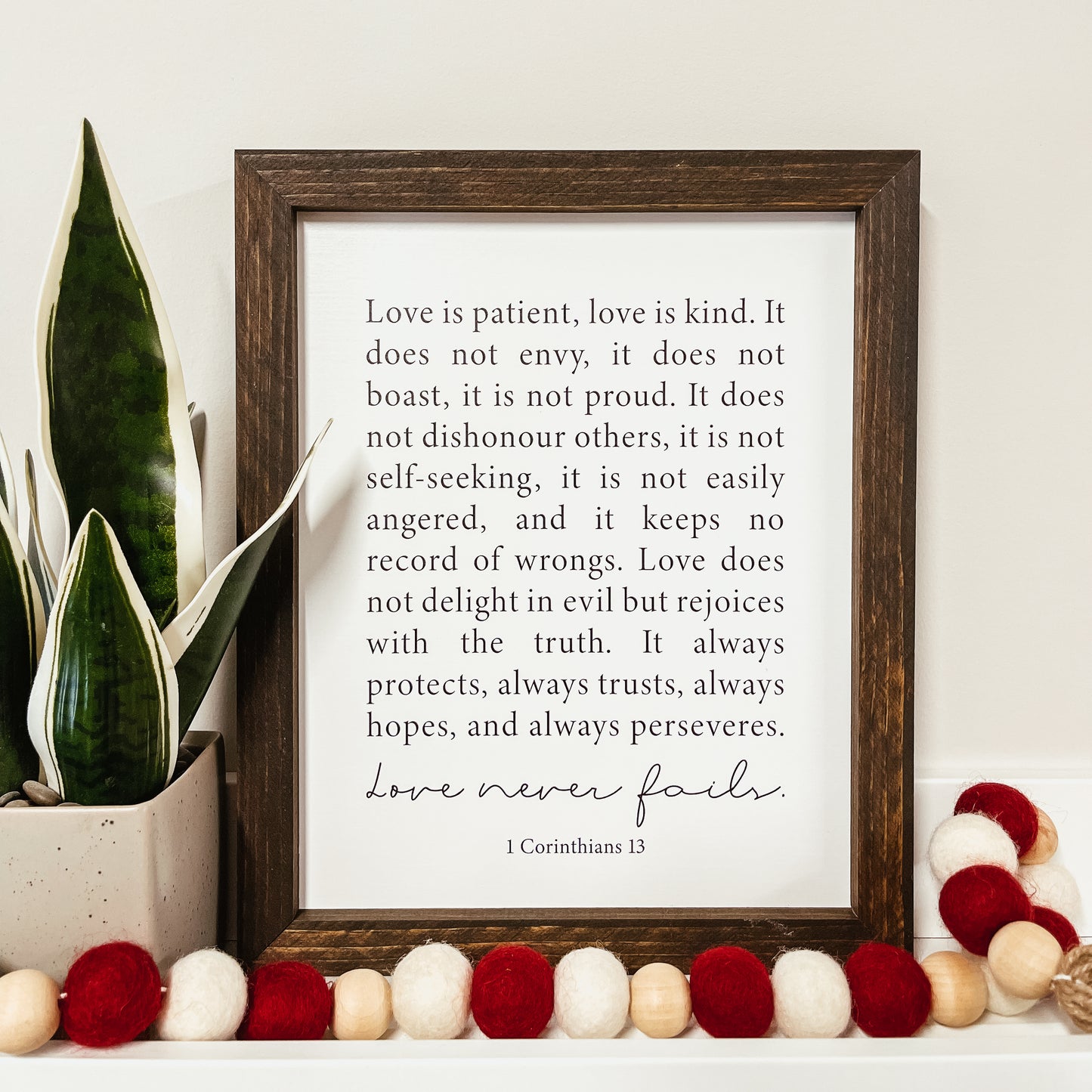 Love Never Fails Framed Sign