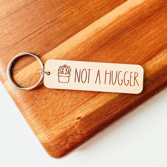 Not A Hugger Keychain