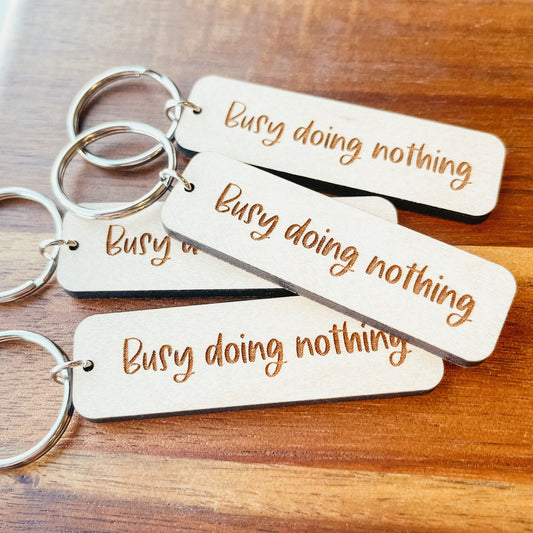 Busy Doing Nothing Keychain